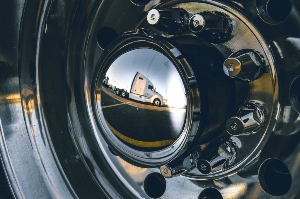 Truck reflection in wheel